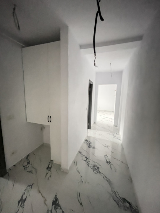 Apartament la parter in bloc nou //  2 camere decomandat.