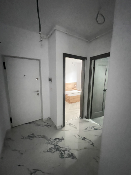 Apartament la parter in bloc nou //  2 camere decomandat.